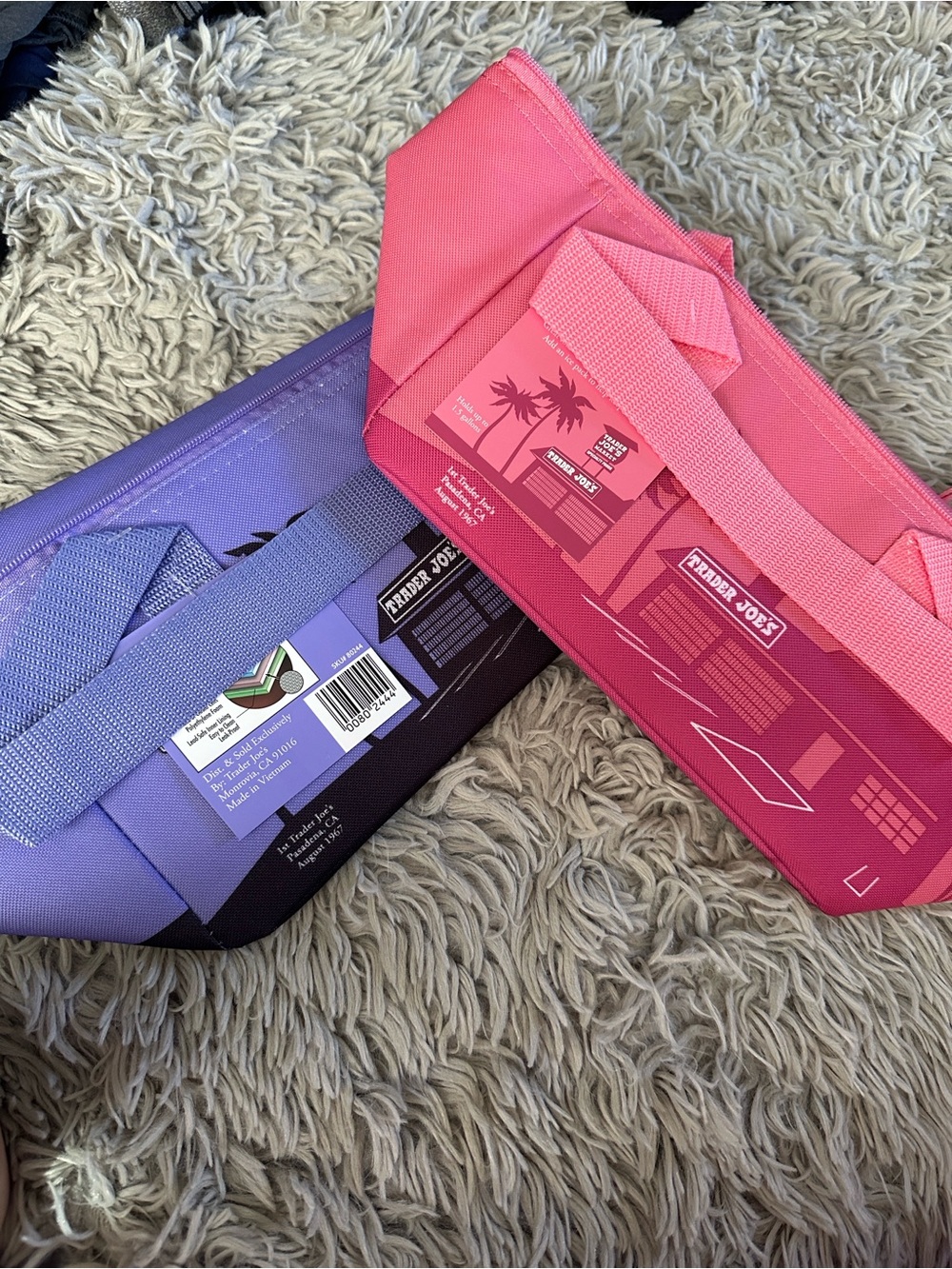 Trader Joe's Pink and Purple Reusable Tote Bag Set. $30 for both.